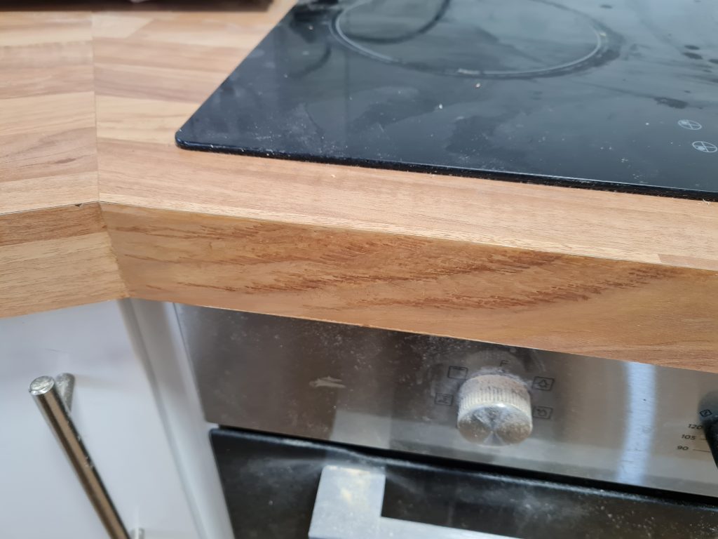 WOOD EFFECT LAMINATE WORKTOP CHIPPED EDGE MANCHESTER AFTER