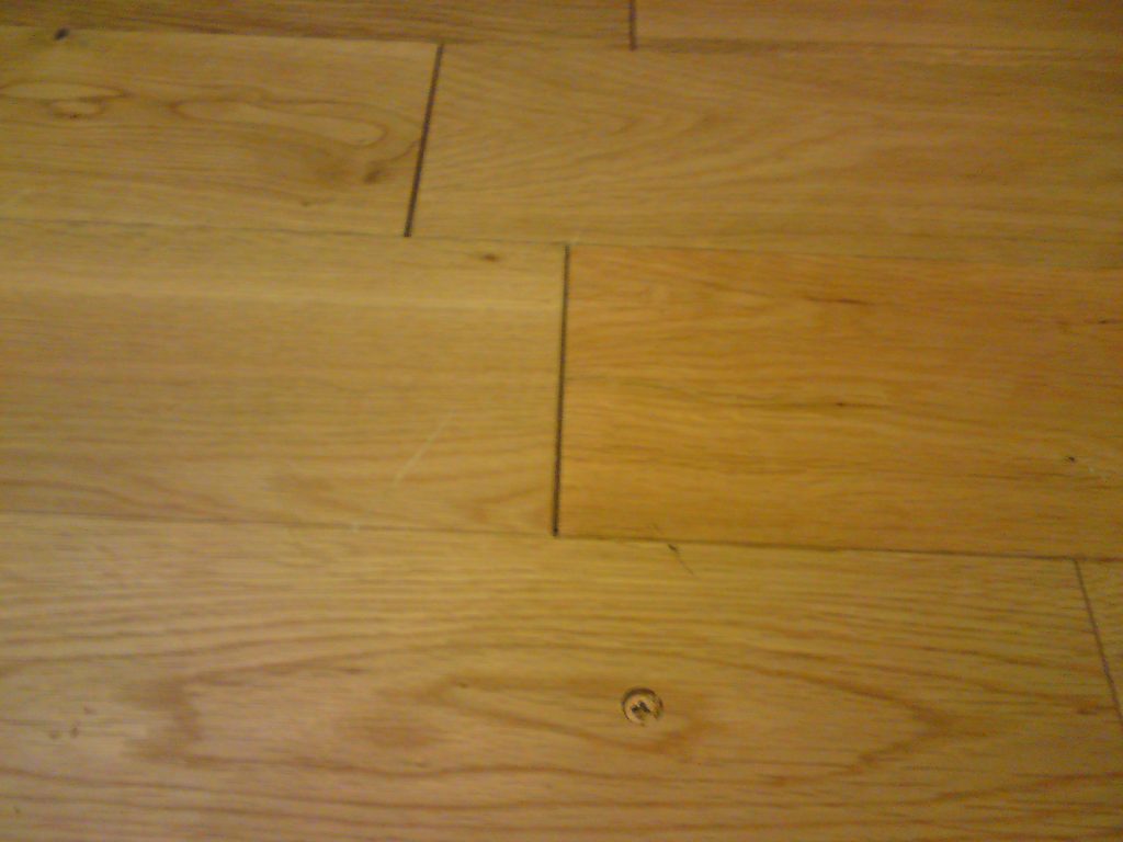 LAMINATE FLOORING gaps and screw hole